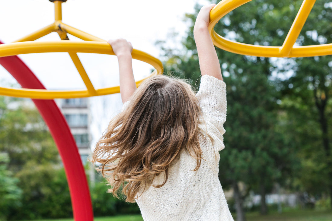 Child playing on a playground