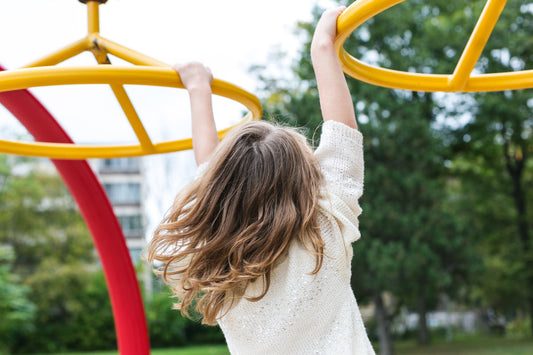 Child playing on a playground